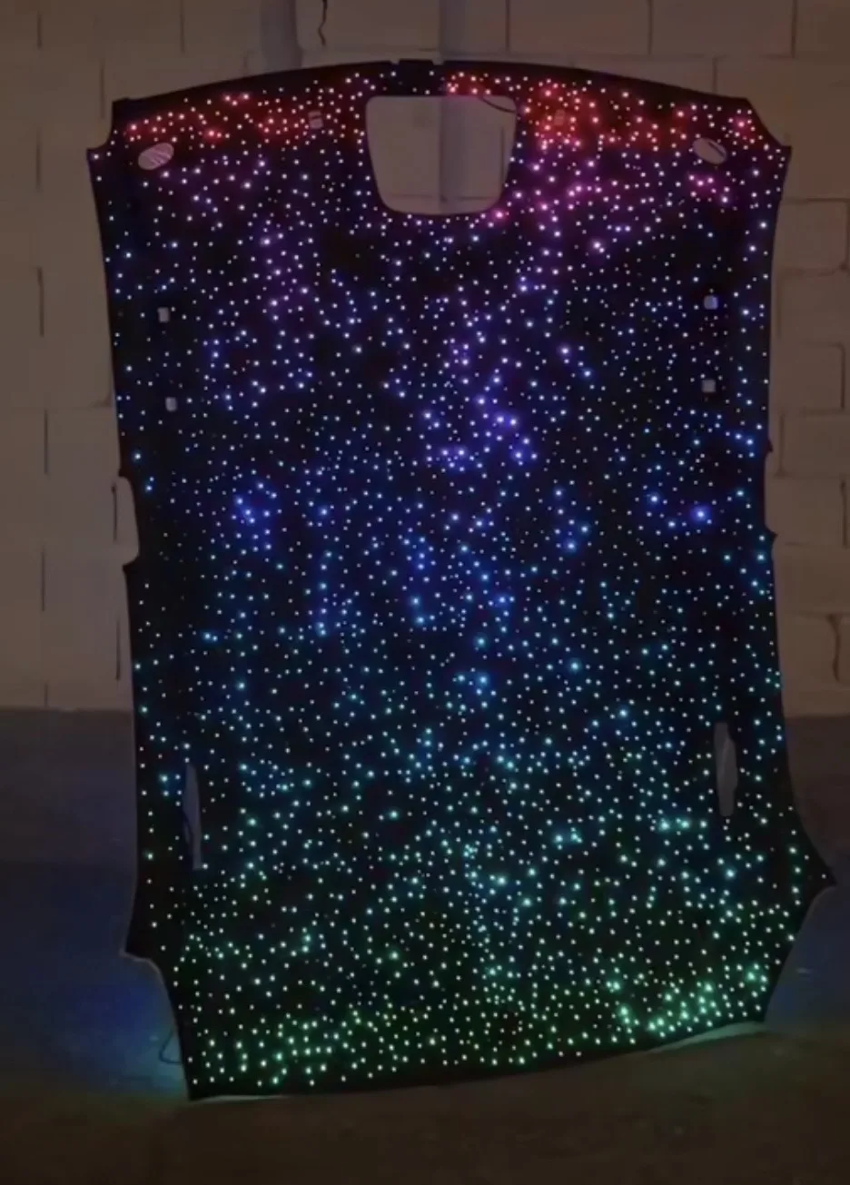 Starlight headliner with shooting star fibers and dense galaxy effect