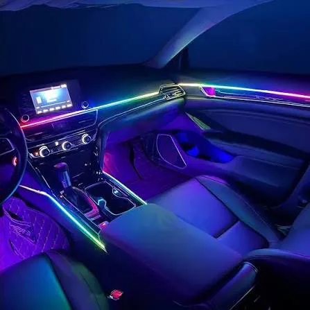 Color-changing ambient lighting illuminating a vehicle dashboard