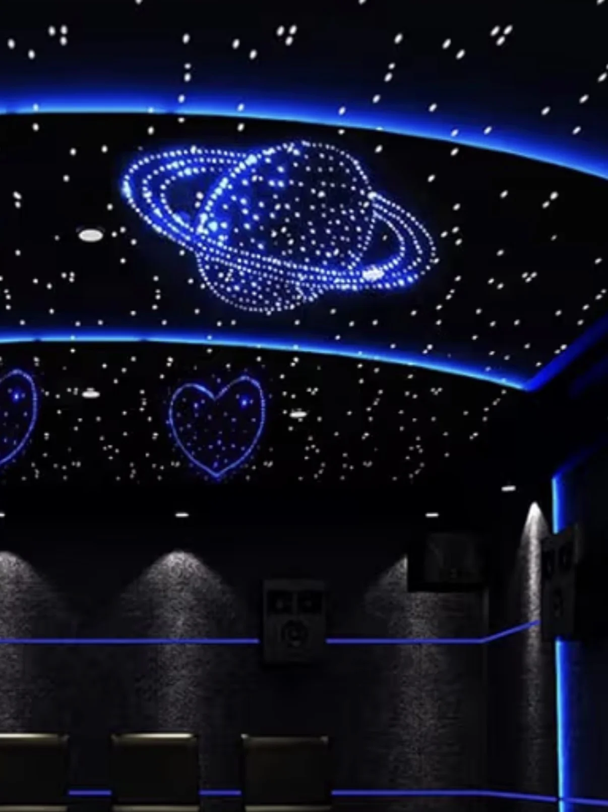 Game room fiber-optic ceiling with blue ambient lighting, Saturn planet design, and heart shapes