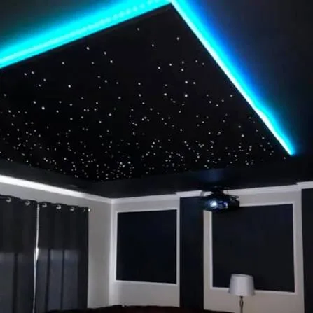 Home movie theater with a fiber-optic starlight ceiling panel overhead
