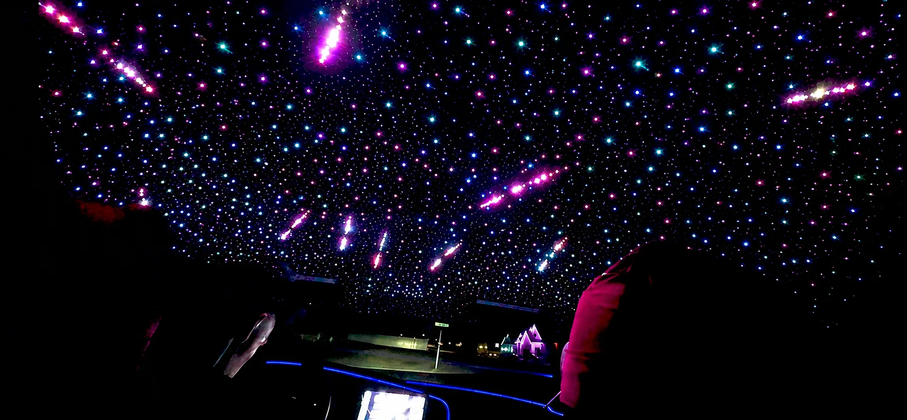 Signature starlight headliner package — fiber-optic star field in a vehicle ceiling