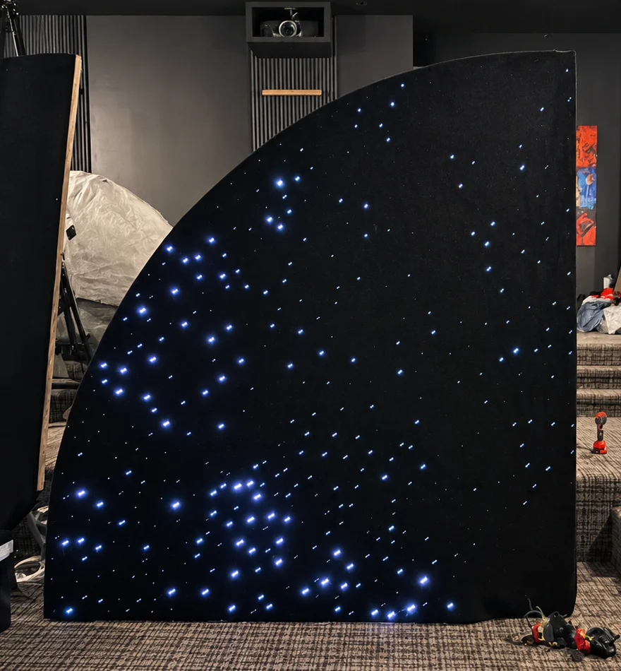 A 9-foot-tall StarLight XXL curved panel lit with fiber-optic stars, standing upright before installation